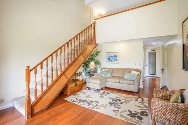 Spacious living area welcomes you with warm island-inspired vacation comfort