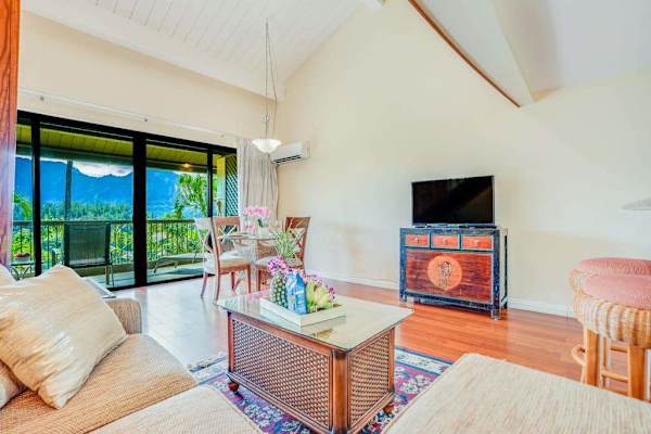 Unwind comfortably in this airy living space with outdoor views