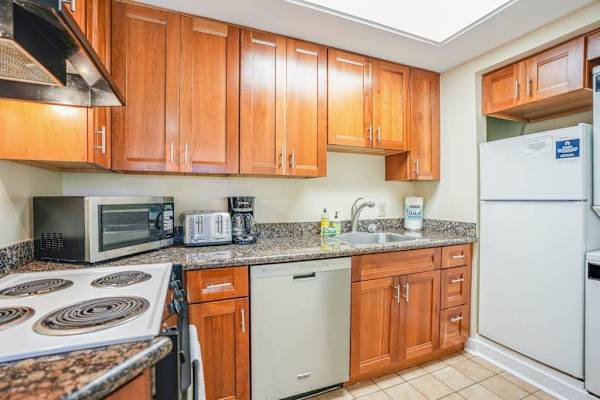 Cook delicious meals in this warm and functional kitchen space
