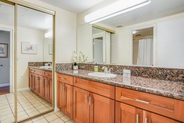 Spacious bathroom vanity provides plenty of room for daily routines