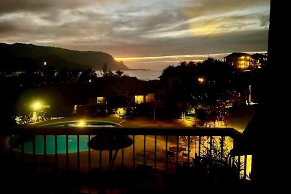 Enjoy peaceful evening views overlooking the beautifully illuminated resort grounds