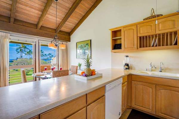 Spacious Kitchen Breakfast Bar Overlooking Dining Area & Ocean Horizon