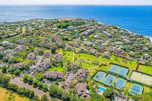 Aerial View of Coastal Resort Property & Surrounding Ocean Landscape