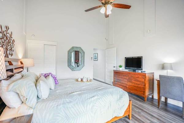 Rest comfortably in this welcoming bedroom with bright open surroundings