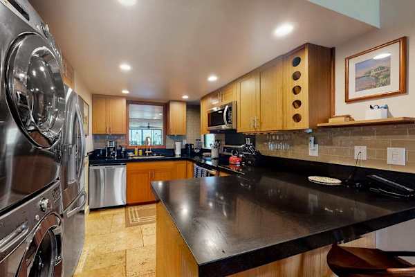 Prepare favorite meals easily in this spacious well-equipped modern kitchen