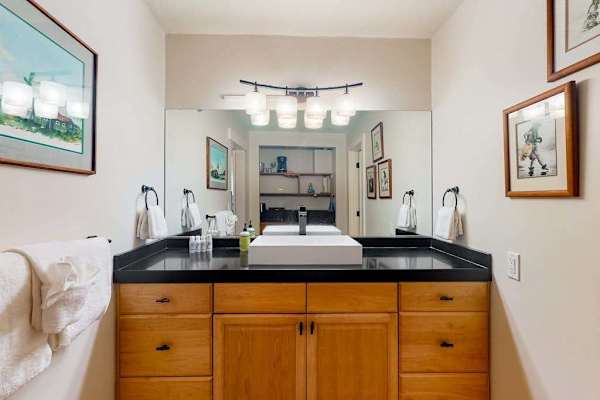 Spacious bathroom vanity makes getting ready easy throughout your stay