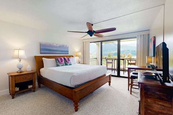 Recharge comfortably in this peaceful bedroom after exploring the island
