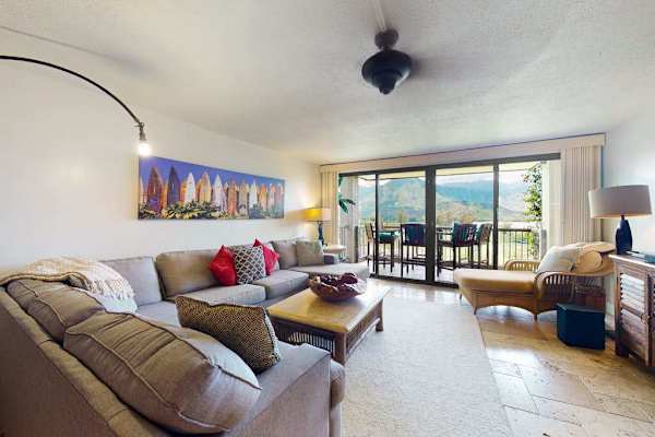 Relax together in this bright living room with comfortable seating