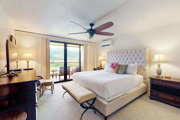 Rest peacefully in this inviting bedroom with bright natural surroundings