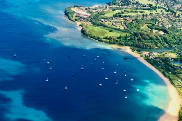 Stunning aerial view showcases sparkling waters and beautiful tropical coastline