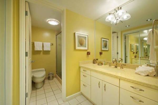Bright bathroom offers plenty of space for comfortable daily routines