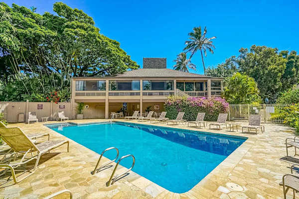 Sparkling Pool Surrounded By Tropical Beauty