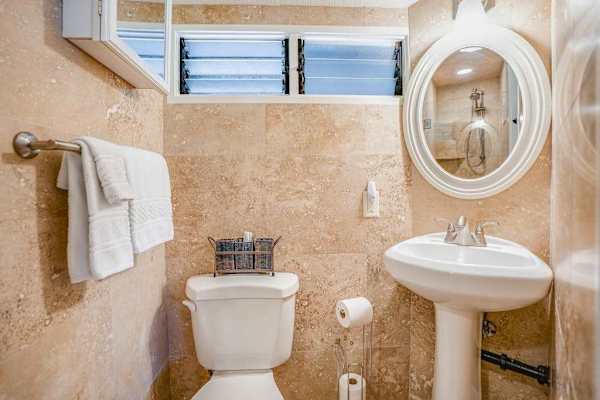 Guest bathroom with walk in shower.
