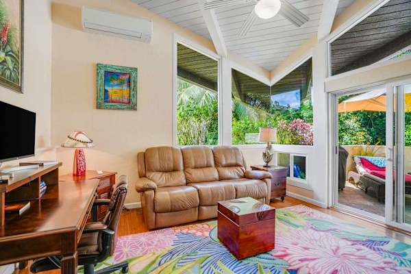 Lovely living room with large picture windows.
