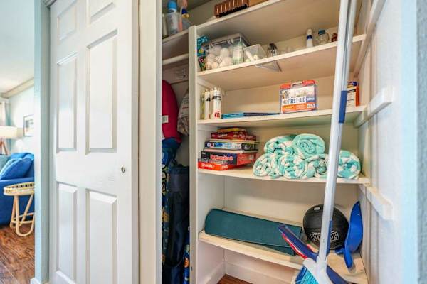 Organized Storage Closet With Guest Essentials