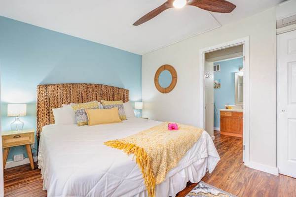 Charming Bedroom With Rattan Headboard