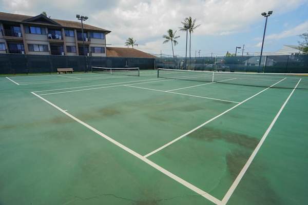 Sunny Tennis Court For Active Getaways