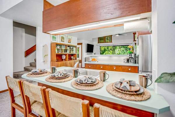 Four barstools for extra seating at the kitchen counter. 
