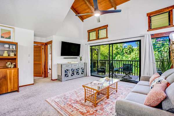 This open concept living and vaulted ceilings gives a welcoming feel.  Natural light streams in from the lanai doors.