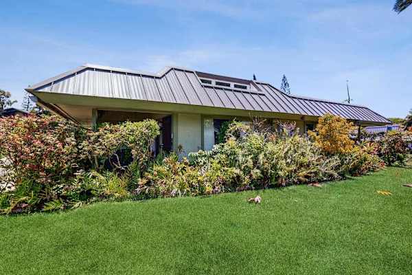 Lush Tropical Garden Surroundings Framing the Exterior Walkway