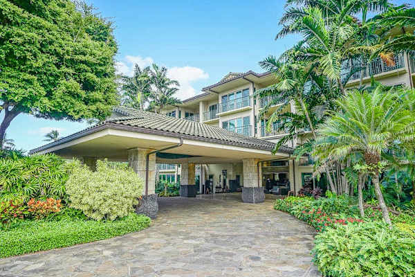Grand Resort Arrival Surrounded By Lush Gardens
