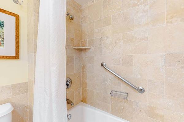 Spacious bathroom with storage for personal essentials