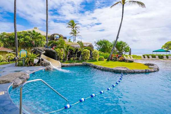 Resort pool with lounge chairs for sunny afternoons