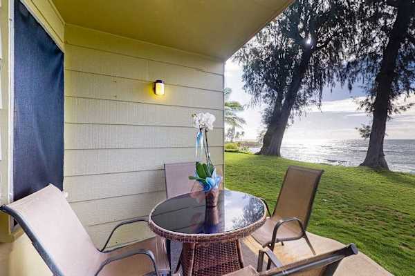 Enjoy ocean breezes from your private lanai with comfortable seating.