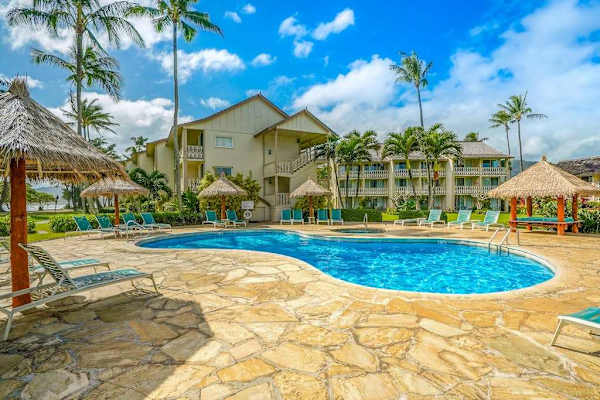 Poolside Paradise Under Swaying Palms