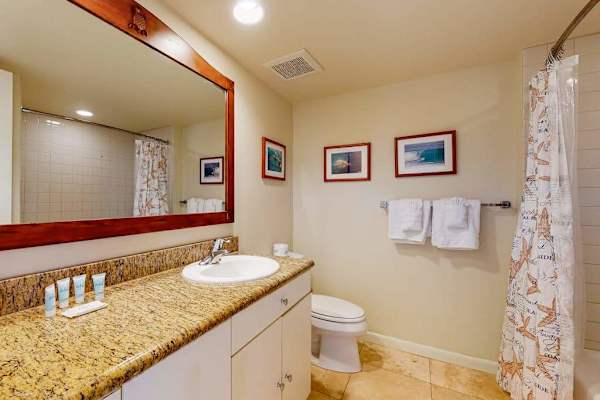 Bathroom with a large mirror for your daily routine.
