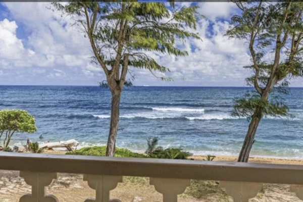 Turquoise Ocean Waves Framing Your Balcony View