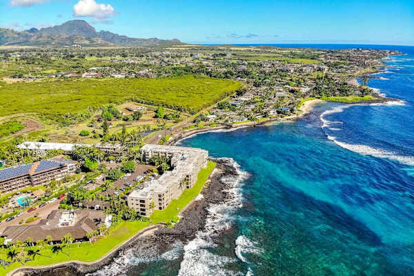 Sweeping aerial views of the resort and coastline