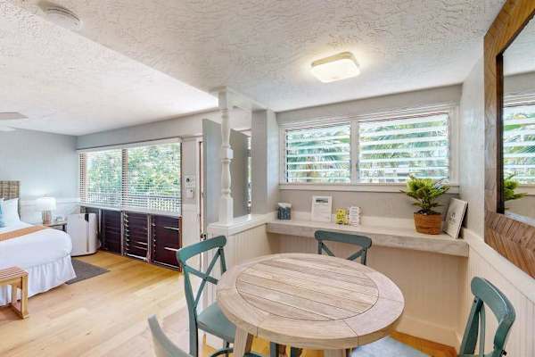 Covered dining space with tropical views