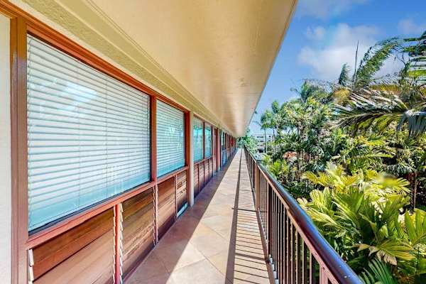 Private lanai overlooking lush tropical greenery