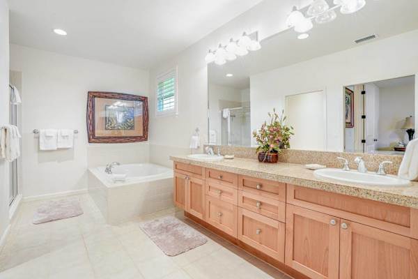 Master bathroom with double sinks, garden tub and a walk in shower.  