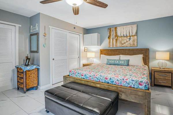 Bright Primary Bedroom With Coastal Charm