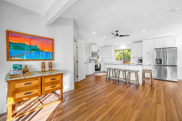 Fully Equipped kitchen and dining island with stainless steel appliance