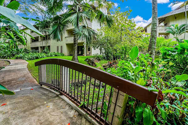 Garden bridge overlooking lush tropical grounds