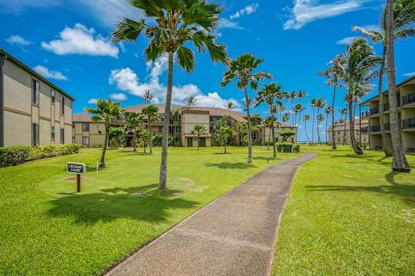 Pono Kai Resort, includes 12-acre grounds, an outdoor pool, a hot tub, a shuffleboard area, a barbecue facility with gas grills, a sauna, golf putting greens, Ping-Pong tables, a croquet lawn, a fitness center, tennis courts, and laundry facilities.