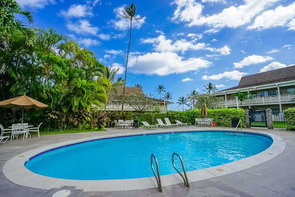 Resort Pool Surrounded By Tropical Beauty