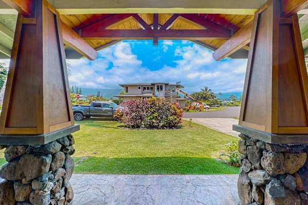 Covered front porch with timber and stone pillars
