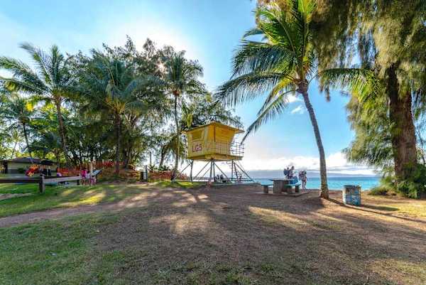 Shaded outdoor lookout area with ocean views — perfect for relaxing in the breeze.