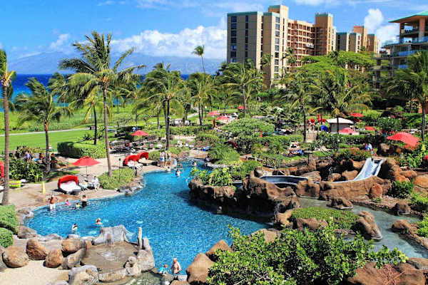 Beautiful resort pool with clear blue waters, perfect for a refreshing swim.