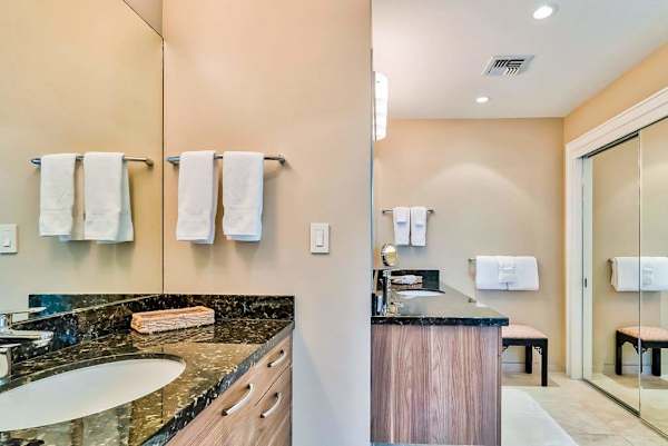 Master bathroom with newly remodeled large walk-shower and double sinks.