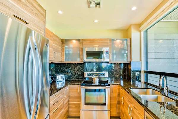 Fabulously remodeled new kitchen with stainless steel appliances and granite countertops.