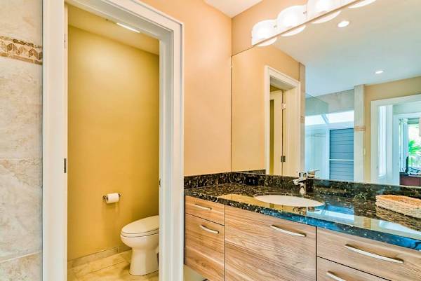 Master bathroom with newly remodeled large walk-shower and double sinks.