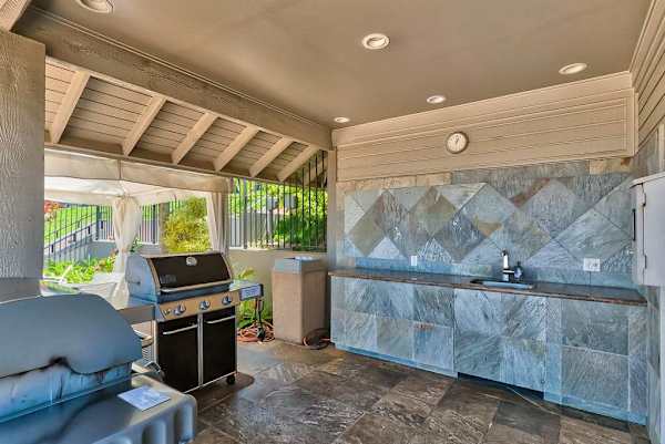You'll have access to the pool's grill area and tennis court, as well as the beach below - so be sure to bring your provided beach chairs along! Ocean views and a glimpse of nearby island Molokai greet you from this rental.