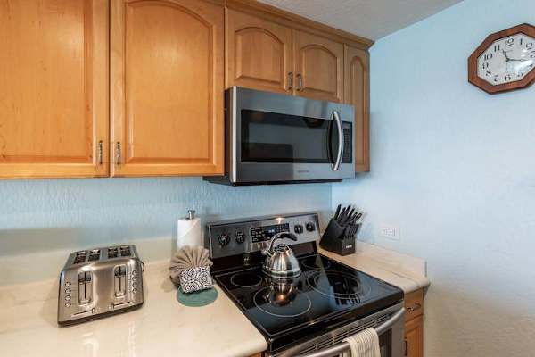 The home features several renovations including new finishes and an upgraded kitchen with stainless steel appliances and gleaming countertops - here, you'll have all you need for cooking delicious meals. 