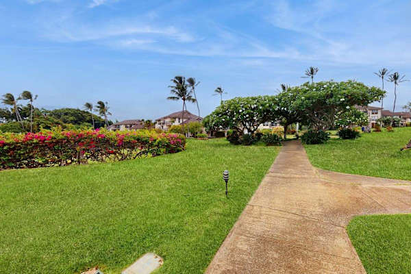 Stroll through beautifully landscaped tropical gardens