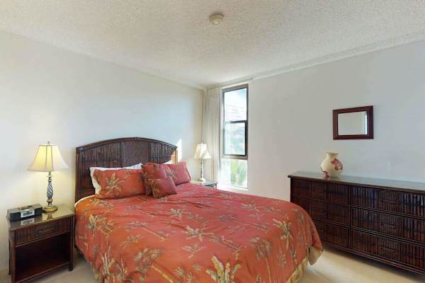 Master bedroom with king bed and lots of natural light.